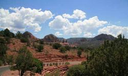 Undoubtedly one of the best red rock view lots available in Sedona. This sloping lot is the ideal place in the subdivision to build a dream home with incredible views of the Cathedral Rock, Bell Rock, Courthouse Butte and the entire Chapel area. This