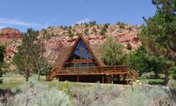 Nestled in the rocks on 2.1 aces in Kanab's most exclusive subdivision sits the home of your dreams. This one owner 4,000 sq ft Triple A-Frame home with cedar shake roof is in pristine condition and has been professionally maintained inside and out. The