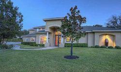 Mediterranean Jauregui architecture, Cantera stone columns and huge Cantera iron doors. Immaculate home with upgrades you would typically see at double the value. Towering ceilings and massive windows make for dramatic great room. Second living area/media