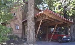 Large family home, original owner, lots of pine walls, open beam ceilings, rock fireplace, easy access, sunny corner lot, close to hiking trails.Listing originally posted at http