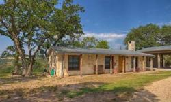 Charming renovated rock cottage with live water. Property is 5.13 acres with 500' of both sides of Townn Creek. Open living area with beautifuly designed pine ceilings and limestone masonary fireplace. Kitchen includes granite countertops, delta faucets,