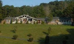 is situated on open, gentle rolling and beautifully landscaped 3 plus acre site that is secluded, private and quiet. It was the family estate of Dr. Breidenthal. Centrally located in Avery County- the highest elevation of any county east of the
