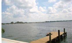 "Short Sale". If you are looking for an affordable waterfront home in the traditional Florida ranch style, then you won't want to miss this one! Located on wide open water of the Palma Sola Bay in the Flamingo Cay subdivision, here you will find a lovely