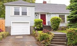 This gorgeous restored split level Cape Cod maintains it's vintage quality and sits high off the street with a peek-a-boo down town view. It features large bright newer windows, open floor plan, newer roof, newer furnace, sewer line replaced and