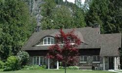 Absolutely stunning Kirtland Cutter "Rock House" with 270 ft frontage on Pend Oreille River with Loft bedroom and 1 bath carriage house. Unbelievable woodwork, stone fireplace, sunken living room, amazing attention to detail throughout.
Listing originally