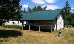 GREAT 2 BED, 1 & 1/2 BATH CABIN ON 15 ACRES WITH WELL AND SEPTIC! New metal roof and well, rustic bar and cabinets in cabin. Wood heat with back up propane for heat. The 15 acres are heavily wooded, very thick with some low areas, cedar, birch, tamarack