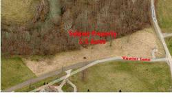 Looking for a Great Building with with some Woods? This Nice wooded 5.21 acre tract is situated only 2 1/2 miles South of I-64 Exit 35 and provides the country atmosphere with the easy access to city conveniences. Frontage on both Rockbridge Roads and