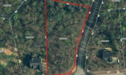 1.45 acre corner available in the beautiful Garrison Woods subdivision, close to Fairview Road shopping and dining! Visit http