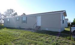 This 2011 Champion 16X70 home is move in ready and still feels like new! You will not be disappointed in this mobile home. The home offers 3 bedroom and 2 full baths with an open kitchen, eat in area, and living area. Located in Cottonwood Village Lot
