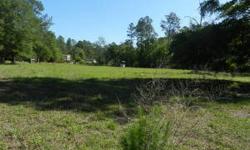 Nice 1.63 acre lot zoned for mobile home. Partially fenced close to shopping. Paved road.Listing originally posted at http