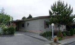 Been wishing for something with quality appointments at an affordable price in a quiet,friendly, convenient SENIORS park. DO NOT pay any mind to the chronological age....with newer roofing,siding, windows, HVAC, distressed stranded bamboo flooring and a