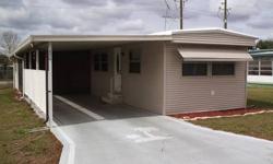 This very nice 2 bedroom mobile home is located in popular Oaks Royal I & II subdivision, just a little west of Zephyrhills, Florida. This is not a rental park and you own the land under the homes here. Oaks Royal I & II is also on the state's list of
