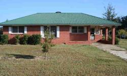 Brick home on large 1.58 ac lot on outskirts of Cottondale in country setting & just minutes to downtown. Plenty of room for garden, animals, etc. Home has 3 bedrooms and a large kitchen/dining area. The master bedroom has a fireplace. There is a nice