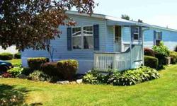 Come and take a look at this very lovely, well kept and fully applianced doublewide in quiet park. Features include three good sized bedrooms, two baths, a large dining area and a spectacular eat-in kitchen. Park rent is approximately $300.00 and includes