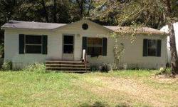 Drive down a lovely treed lane to a gated and fenced three acres with a 3/2 mobile home. Ocala Marion County Association of Realtors is showing this 3 bedrooms property in Micanopy.