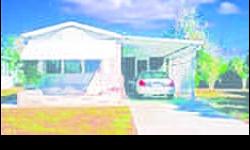 NORTH PORT - 2BR/2BA, HOLIDAY PARK. LAND OWNED WITH A DEED. Gated 55+ Park w/ 2 pools, wood laminate flooring, lg. LR w/ vaulted ceiling + attached lanai & laundry room. $39,900/obo. 941-408-5642