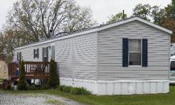 Built in 2000, this single wide trailer in Roy's Mobile Park makes for a great starter home. It features 3 bedrooms and 2 full bathrooms, skylights in the kitchen, ceiling fans in the master bedroom and kitchen and a master bedroom en suite.
Listing