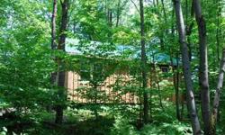 This 24 x 30' already built cabin shell is located on a private, dead end, gravel road with power available at the property. The property is composed of an all wooded parcel with over 700 ft of stream frontage. It is 5 minutes north of Camden and is in