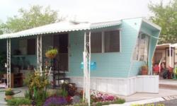 Nice 55+ mobile home for sale in great location just off 95 and Boulder Hwy. Open and large kitchen, almost new stove, frig stays, lots of storage space. Breakfast bar, near new heat system, just replaced floors. Large bath with tub and shower, one