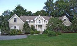 Located on a prime mid-country lane, this well planned colonial elegant and grace throughout, with a generous portion of drama as well. Enter the property along a circular stone pebbled driveway and notice the expansive front lawn with a play set and