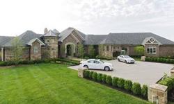2012 INDIANAPOLIS MONTHLY DREAM HOME!!! SPRAWLING RANCH SITUATED ON 1.77-AC IN PRESTIGIOUS, GATED LAUREL RIDGE. EXQUISITE DETAIL & DESIGN, FIRST CLASS AMENITIES, SOARING CLNGS & OVERSIZED DOORS, ELABORATE MOLDINGS, INFINITY POOL AND SPA, 4.5 CAR GARAGE,