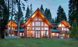 Situated on over an acre of prime lake front property, this custom built log home offers the ultimate in mountain luxury living! Incredible features include