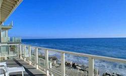 Oceanfront Parcel with Private Beach! This prime property consists of 85 linear feet plus your own private beach large enough for a volleyball court or private beach parties! This home was remodeled in 1996 and provides 4 bedrooms, 5 baths and a separate