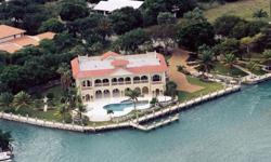 Duck Key, Florida KeysBehind a gated entry, at the end of an old Chicago brick drive, sits a 5,497 square-foot Mediterranean masterpiece. Completely remodeled in 2001, the estate include 3 en suite bedrooms, 2 half baths, a formal living room and dining