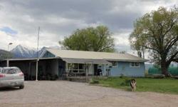 Dairy operation with newer equipment for 16 cows, on 80 irrigated acres. 3 bedroom, 2 bathroom home with some new flooring. Good basic floor plan & solid home on full basement. Needs updation & clean-up. 16 stall milk parlor with ball equipment being only