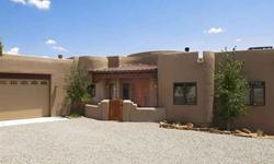 WOW Factor! Gorgeous Santa Fe home! Rarely do you find a house in this price range and in such immalucate condition. Bordering a greenbelt and sitting on .45 acres close to the Santa Fe Community College, the 599 Rail Runner Station and the Amy Biehl