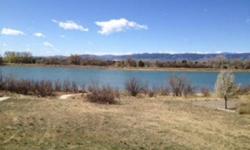 One-of-a-kind, close-in, lakefront lot in NW Fort Collins at Hearthfire Estates! Only 8 minutes on all-paved roads to Old Town and CSU! Build your custom home with a 10-12 ft deep walk-out on Richards Lake. Stunning views from the shores, back drop of