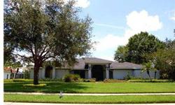 Fabulous pool home in one of Lakeland's most desirable communities which is located just steps from Lakeside Village. Enter to the homes large open entertaining area which features a full wet bar, volume ceilings and view of the pool and lake. The master