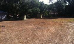 Lot with plenty of trees and shade for home to be built on! 2 sheds do convey with property. Already has fence.