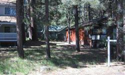 WHAT A GREAT LOCATION TO BUILD A SMALL CABIN IN THE WOODS ~ FLAT LEVEL LOT WITH EASY ACCESS, CLOSE TO GOLF COURSE, NATIONAL FOREST, AND BEAR MOUNTAIN SKI AREA. JUST MINUTES TO LAKE, GROCERIES AND RESTAURANTS FROM THIS WELL TREED MOONRIDGE