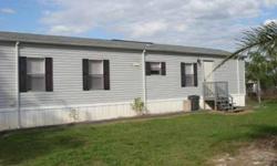 Absolutely spotless mobile home in quaint area conveniently located between Lake Placid and Sebring. Nice fenced in back yard with shed/workshop. Kitchen appliances are in mint condition as is the rest of the home! Very quiet neighborhood! Lot is