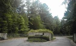 Utl easements are as recorded.Wooded lot with the complete feel of seclusion and peaceful country living but in a gated subdivision. All lots are spacious. There is an HOA. Close to Lake Palestine, fishing or boating in a matter of minutes, yet wonderful
