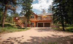 Stunning COLORADO STYLE Mountain Home Surrounded by Towering Pine Trees on .42 Acre! Wonderful OPEN FLOOR PLAN features vaulted GREAT ROOM with KNOTTY PINE Ceiling, WB FIREPLACE & 'Prow' Front Windows to enjoy the views. The Gourmet Kitchen with Island,