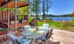 Enjoy the Pacific Northwest waterfront life-style. 100 feet of unobstructed waterfront views, your own dock and deck space galore, this is the place for nature lovers to call home. Lovely views from almost every window & a yard that explodes in the spring