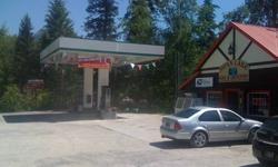 Charming Bavarian-style gas station / convenience store attached to a 4-bedroom home with Swan Lake views and deeded access. Store includes fully operational gas pumps and tanks, licensed and tested for DEQ compliance, state of the art PCI compliant POS