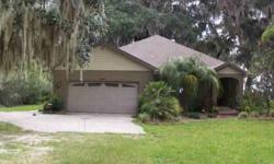 True Florida Living at it's best!!!! Lake Kerr waterfront property with beach, dock and boat house. Beautifully landscaped front entry, tiled foyer, Living Room, eat in kitchen with granite counter tops. Family Room and Dining Area boasts a 3 sided FP and