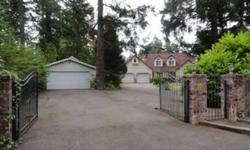 amazing private gated compound with three dwellings on .79 acres awaits. the main house is a full 2782 sq ft with a master on the main. the 1 bath guest house is 1400 sq ft and has it's own 2-car garage. the 500 sq ft studio has one full bath and would