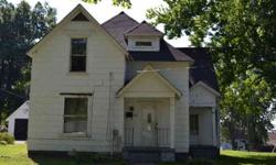 This could be a lovely home. It does need some work. It has a large living room,nice size dining room with a bay window,has hardwood floors,nice size kitchen ,bathroom down stairs and one upstairs. There are three bedrooms upstairs and the bathroom has an
