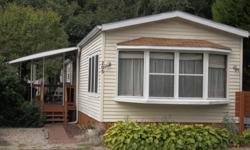 single wide, 2 bedrooms, all appliances included ,frig, stove, dishwasher, microwave, radio, washer and dryer, sanyo heat pump/ac, wood windows, laminate wood styled floors throughout, extra large bathroom w/ separate bath and shower stall, new roof