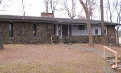For more information, contact Janie Robinson at (479) 640-6688. So much potential! 3 bedroom, 3 bath, 2036 sq ft ranch style home in lovely area. Impressive native stone fireplace, huge trees, large back yard with storage building. Case #031-308492, sold