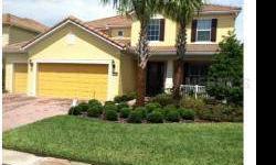 A MUST SEE !! Great family home in the exclusive 24 hr. manned gated community of Village Walk at Lake Nona. Shows like a model! Desireable Cambridge Floor plan with 4 bedrooms, 3 full baths, 2 half baths and home office/den