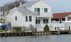 A "Cottage by the Sea"!*Deep Lagoon-approx 13 in center* 57 ft on water* 8 YR OLD VINYL BULKHEAD*30 ft dock* Home meticulously renovated inside & out since 07* 1st floor Guest Bedroom* Gleaming Hardwood flrs* Vaulted Ceiling*Skylight*Open floor