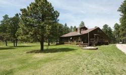 Horses are allowed on this 10 acre property. This super spacious home has 5 bedrooms, 4 bathrooms and is boarded by Forest Service land on one side and designed for energy efficiency with 12" roof (R-38), 2x6 walls (R-19), and 44x11 sunroom for passive