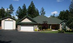 LIVE THE OREGON DREAM...on this immaculate 2.75 park-like acres complete with newer custom home, RV barn/shop, tractor barn & so much more. Built in 2002, this lovely home features 2270 sq ft, 3 bedrooms, 2 baths plus a den, open floor plan, built-in