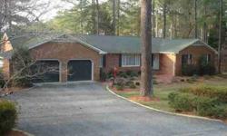 FABULOUS WATERFRONT HOME ON WHISPER LAKE!! This executive home is all brick with an amazing Full width CAROLINA ROOM to capture the stunning views~ GLEAMING wood floors, built ins, Fireplace in cozy DEN area, Formal DINING and Living Rooms. Totally