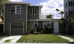 Island living near beach access!Just a few footsteps separate this home from beach access #9 with only a few short blocks from Siesta Key Public beach...making this the ultimate beach house! A brief stroll takes you from beach house serenity to the myriad